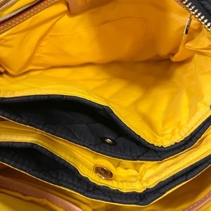 MZ Wallace purse in navy blue with yellow interior . Excellent condition .